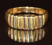 An 18ct gold tri colour ring, 4.3g, size M
