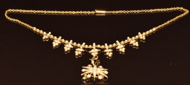Edwardian 15ct gold necklace set with seed pearls, with drop pendant removable to form a separate