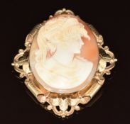 A 9ct gold brooch set with a cameo depicting a woman, 27.5g, 6.5 x 5.5cm