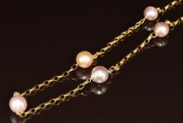 A 9ct gold necklace set with five pink pearls, 15g, 46cm