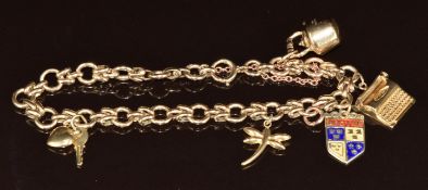 A 9ct gold charm bracelet with five 9ct gold charms including type writer, key and heart, kettle,