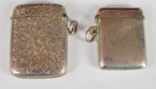 Two Victorian or Edward VII hallmarked silver vesta cases, one with engraved floral decoration,