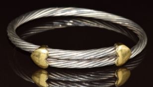 Tiffany & Co rope twist silver bangle with two 18ct gold heart sliders, 36.2g, 5.8 x 6.2cm