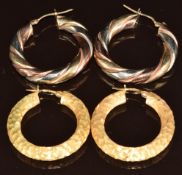 Two pairs of 9ct gold hoop earrings, one bi-coloured and the other pair with a textured finish, 12.