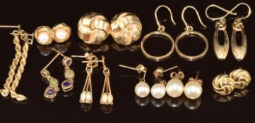 Ten pairs of 9ct gold earrings including rope twist, three pairs set with pearls, amethyst and