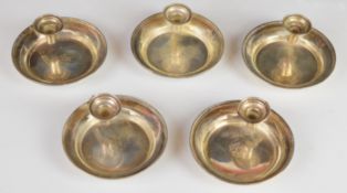 Set of five Reed & Barton American silver chamber stick candle holders, each with American