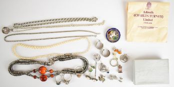 A collection of silver jewellery including four rings, shamrock earrings, three chains/ necklaces,