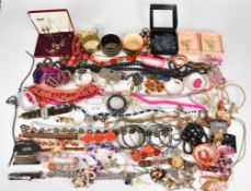 A collection of jewellery including two Kirks Folly elephant brooches, bangles, necklaces, etc