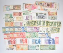 Collection of approximately 150 world banknotes, many uncirculated, including two 1966 Ethiopia $1