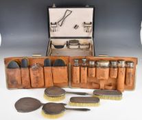 Mappin & Webb hallmarked silver dressing table set comprising hand mirror and four brushes,
