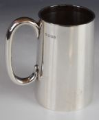 George V hallmarked silver pint tankard of plain tapering form, London 1927, maker H Phillips and