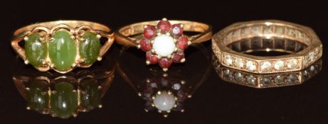 Three 9ct gold rings including eternity ring, opal and garnet cluster and nephrite jade, 6.3g,