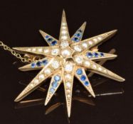 A 9ct gold star brooch set with split pearls, six old cut diamonds each approximately 0.15ct and