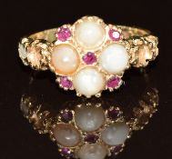A 14ct gold ring set with split pearls and rubies (three pearls missing), 3.1g, size K