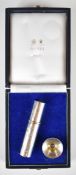 Mappin & Webb modern feature hallmarked silver spray perfume bottle and filling funnel, in