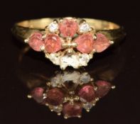 A 9ct gold ring set with garnets (missing a stone), 1.8g, size M/N