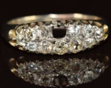 A white metal ring set with old cut diamonds (one missing), 2.8g, size P