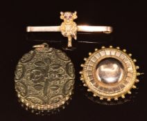 A 9ct gold brooch in the form of a pixie set with spinel eyes (5g, 4.4cm), Victorian 9ct gold brooch