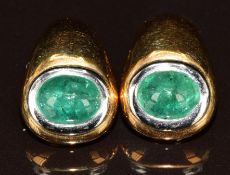 A pair of 18k gold bi-coloured earrings each set with an emerald cabochon of approximately 2ct, 11.