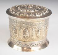 Burmese or similar silver trinket pot embossed with panels of deities to the side, and a Chinese