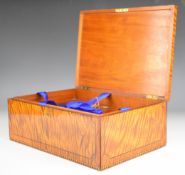 Victorian satin birch workbox with geometric inlaid decoration, opening to reveal a lift out tray