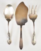 American silver serving spoon and fork marked 0900 and also with American silver marks, together