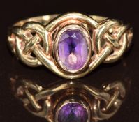A 9ct gold Celtic Welsh gold ring set with an amethyst, 2.7g, size N