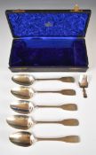 Five Georgian and later hallmarked silver fiddle pattern table spoons to include an Irish example,