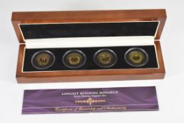 Bradford Exchange Longest Reigning Monarch Gold Double Crown Set comprising four 9ct gold proof