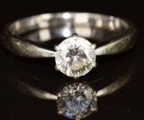 An 18ct white gold ring set with a round cut diamond of approximately 0.7ct, 3g, size N