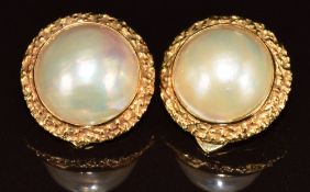 A pair of 18k gold earrings set with Mabe pearls measuring 13.5mm, 12g