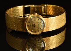 Omega for Tiffany & Co 18ct gold ladies wristwatch with black hands, two-tone baton hour markers,