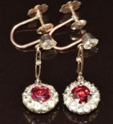 A pair of 9ct gold and silver earrings set with garnets and white sapphires, 5.5g, 3.2cm