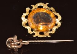 Victorian brooch set with a oval cut citrine (15.9g, 4 x 3.5cm) and a Victorian knot stick pin
