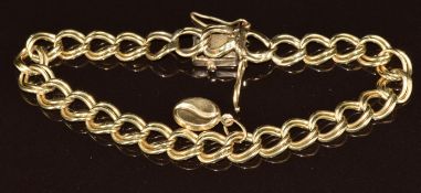 A 9ct gold double curb link bracelet with coffee bean charm, 11.9g, 18.5cm