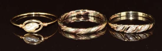 A 9ct gold ring set with diamonds, another 9ct gold ring (3g, sizes P & Q) and an 18k gold ring