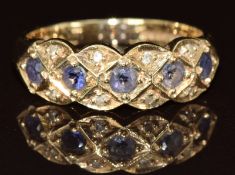 A 9ct gold ring set with tanzanites and diamonds, 3.5g, size P
