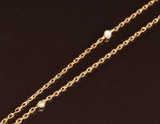 A 9ct gold c1900 guard chain set with pearls, 23.7g, 166cm