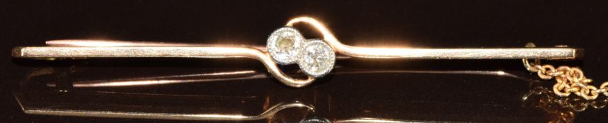 A 15ct gold brooch set with two diamonds, each approximately 0.08ct, 3.2g, 5cm