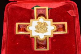 A 14ct gold Elkington and Co pendant/ medallion set with enamel in original fitted box, believed