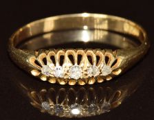 An 18ct gold ring set with five diamonds, 2.2g, size N