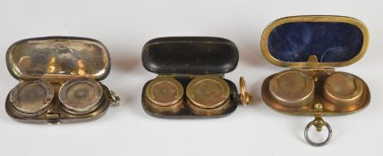 Three sovereign cases, one an Edward VII hallmarked silver double case, Chester 1905, maker