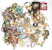 A collection of costume jewellery including Miracle brooch and pendant, vintage brooches, Sarah