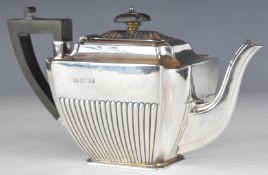 Victorian hallmarked silver teapot of rectangular form, with incuse corners and reeded lower body,
