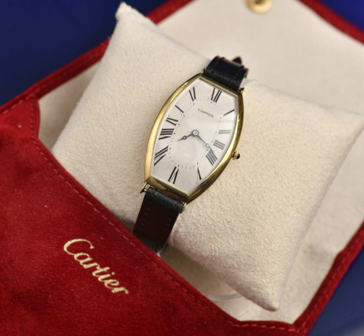 Cartier Tonneau 18ct gold gentleman's wristwatch with blued Breguet hands, silver dial, sapphire set