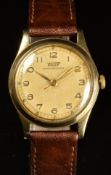 Tissot 9ct gold gentleman's wristwatch with gold hands and Arabic numerals, champagne dial and
