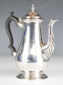 Victorian hallmarked silver coffee pot with carved wooden scrolling handle, London 1891, maker