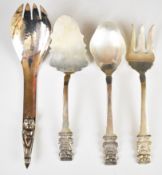Three possibly South American silver serving spoons and forks, marked 0900, length of longest 23.