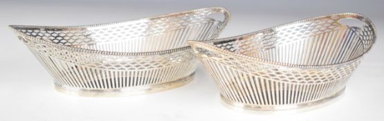 Pair of Dutch silver oval baskets with beaded edges, pierced decoration and Netherlands silver marks