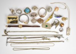 A collection of mainly silver jewellery including eight brooches, ingot pendant, signet ring, 9ct